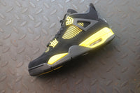 Air Jordan 4 Thunder Black / Yellow Sneakers