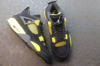 Air Jordan 4 Thunder Black / Yellow Sneakers