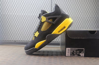 Air Jordan 4 Thunder Black / Yellow Sneakers